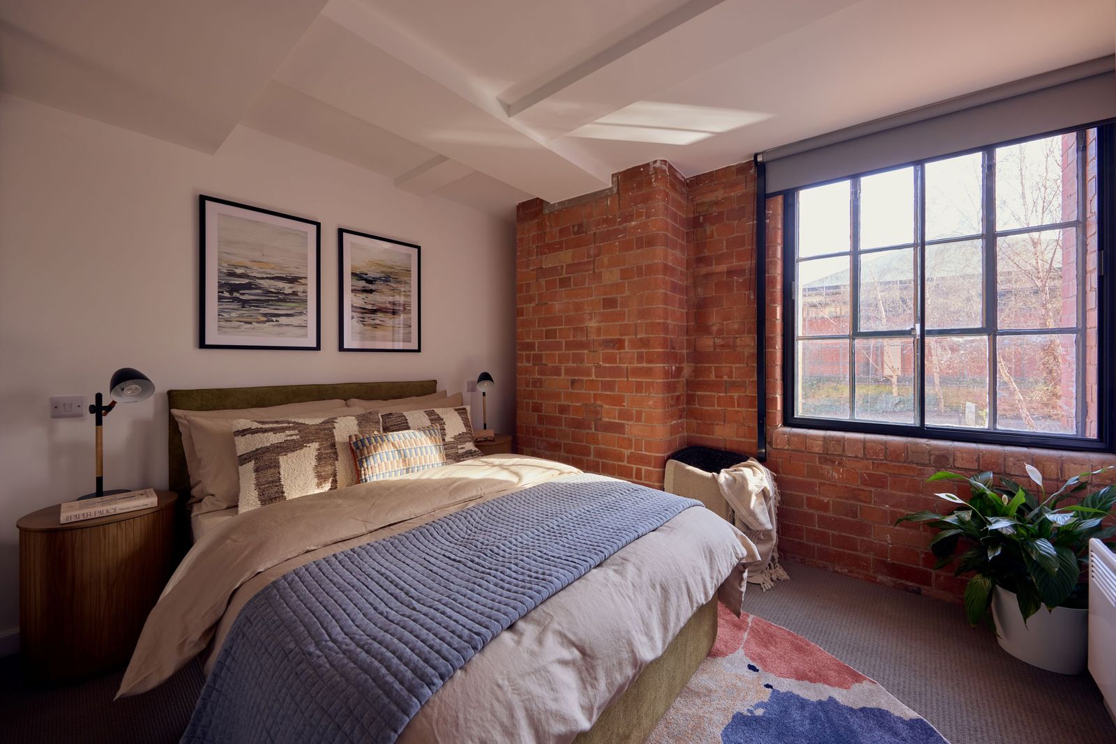 Bedroom with Exposed Brick Wall